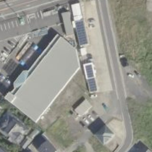 国の航空写真。当社事務所周辺。建物や車の輪郭がぼやけている